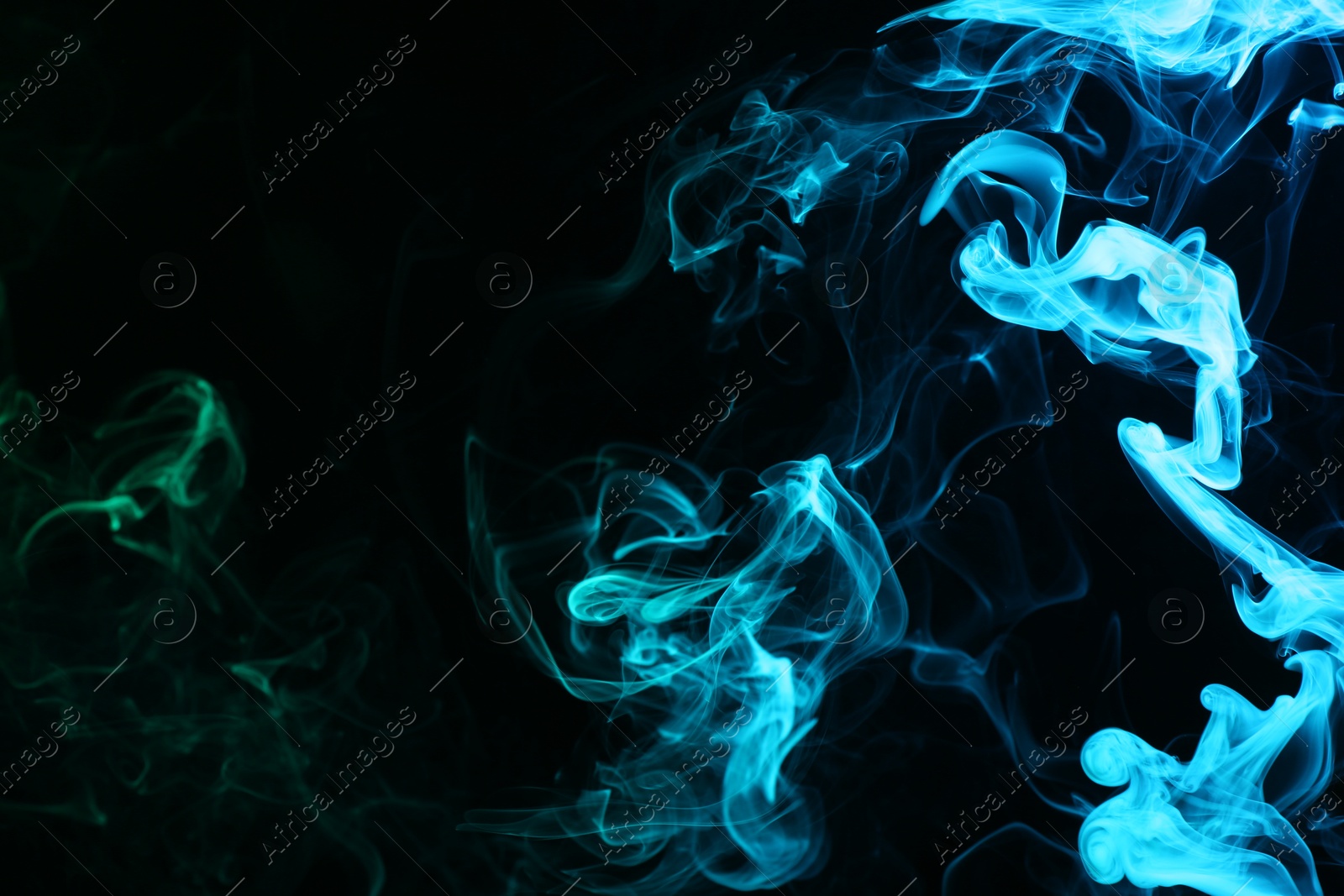 Beautiful smoke in neon lights on dark background Photo of Beautiful smoke in neon lights on dark background