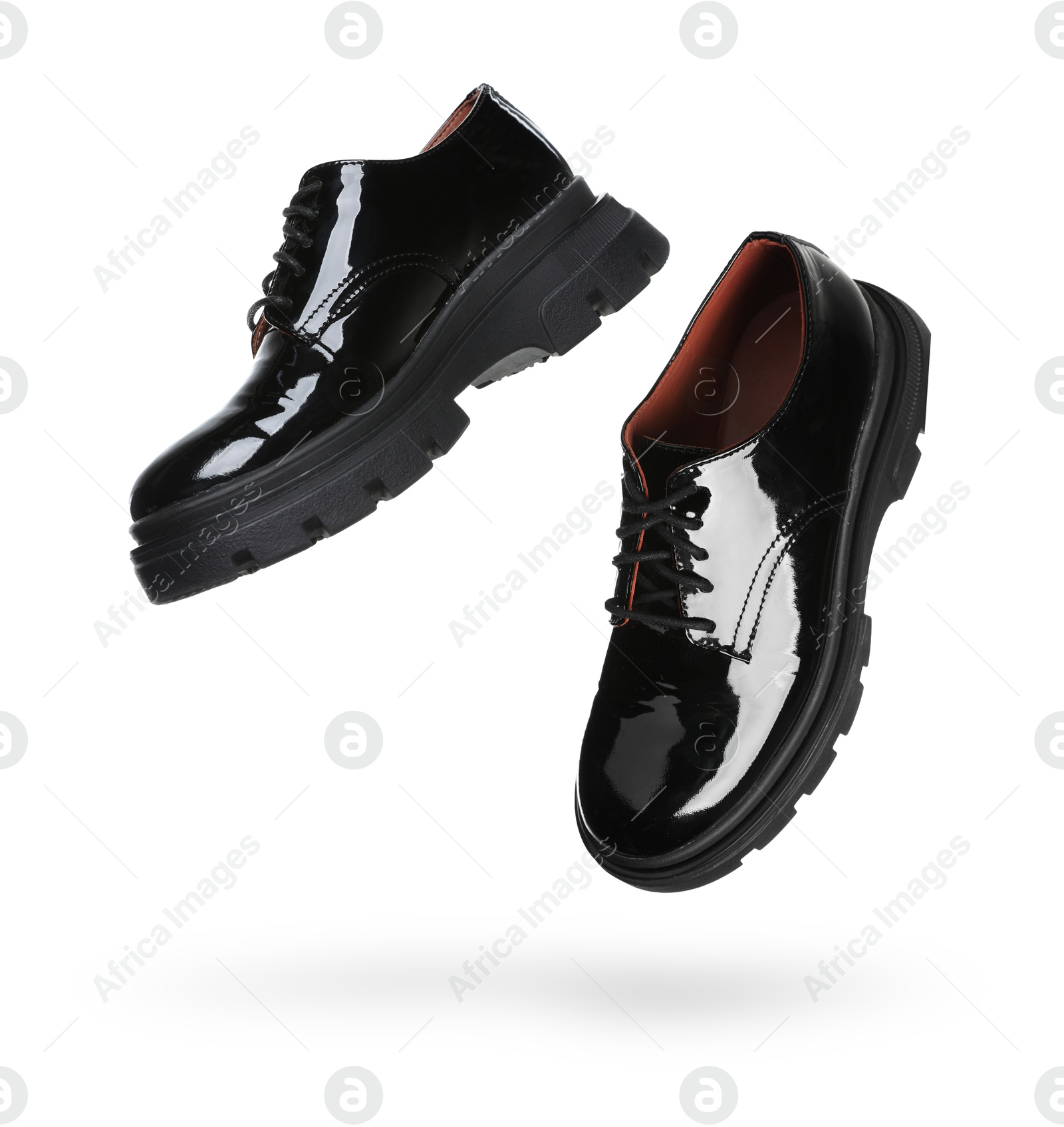 Stylish shoes in air on white background Image of Stylish shoes in air on white background