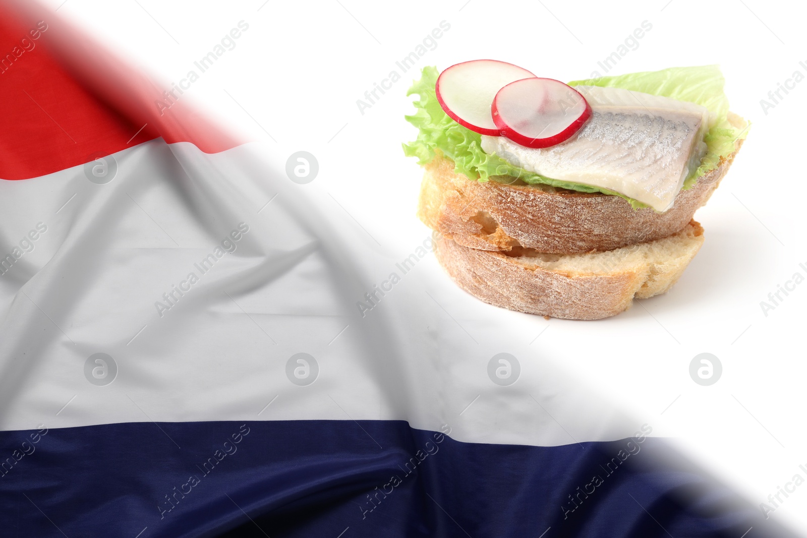 Tasty sandwich with herring on white background and flag of Netherlands Image of Tasty sandwich with herring on white background and flag of Netherlands
