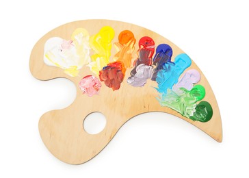 Photo of Wooden palette with paints isolated on white, top view