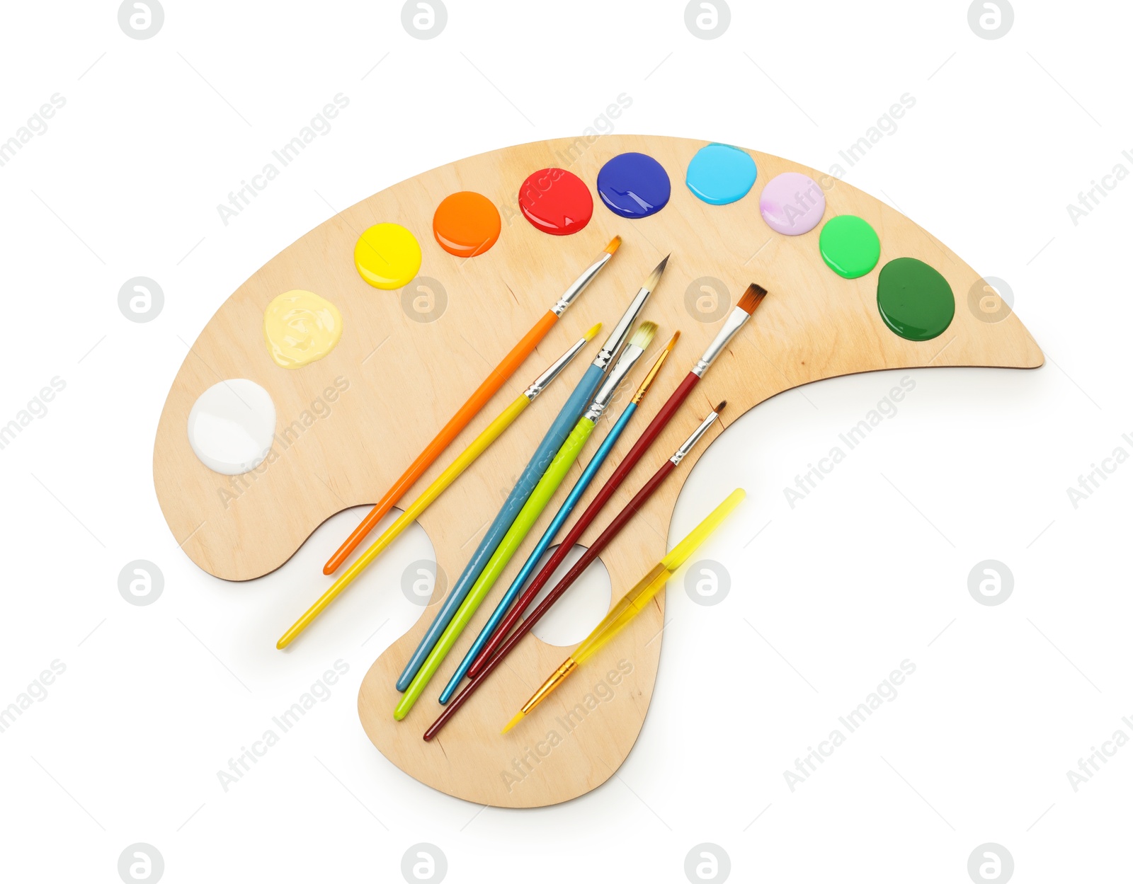 Wooden palette with paints and brushes isolated on white, top view Photo of Wooden palette with paints and brushes isolated on white, top view