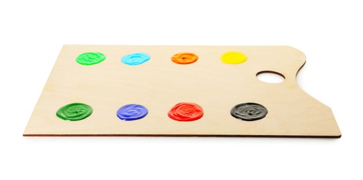 Photo of Wooden palette with paints isolated on white