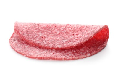 Photo of Slice of tasty smoked sausage isolated on white