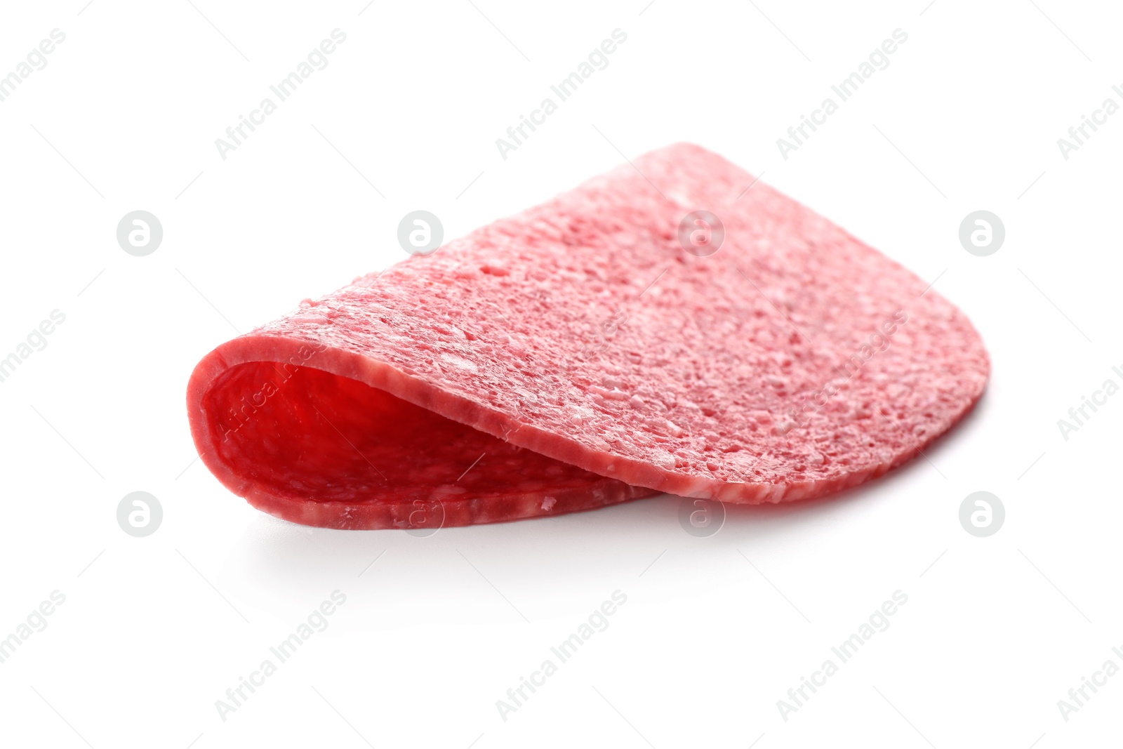 Photo of Slice of tasty smoked sausage isolated on white