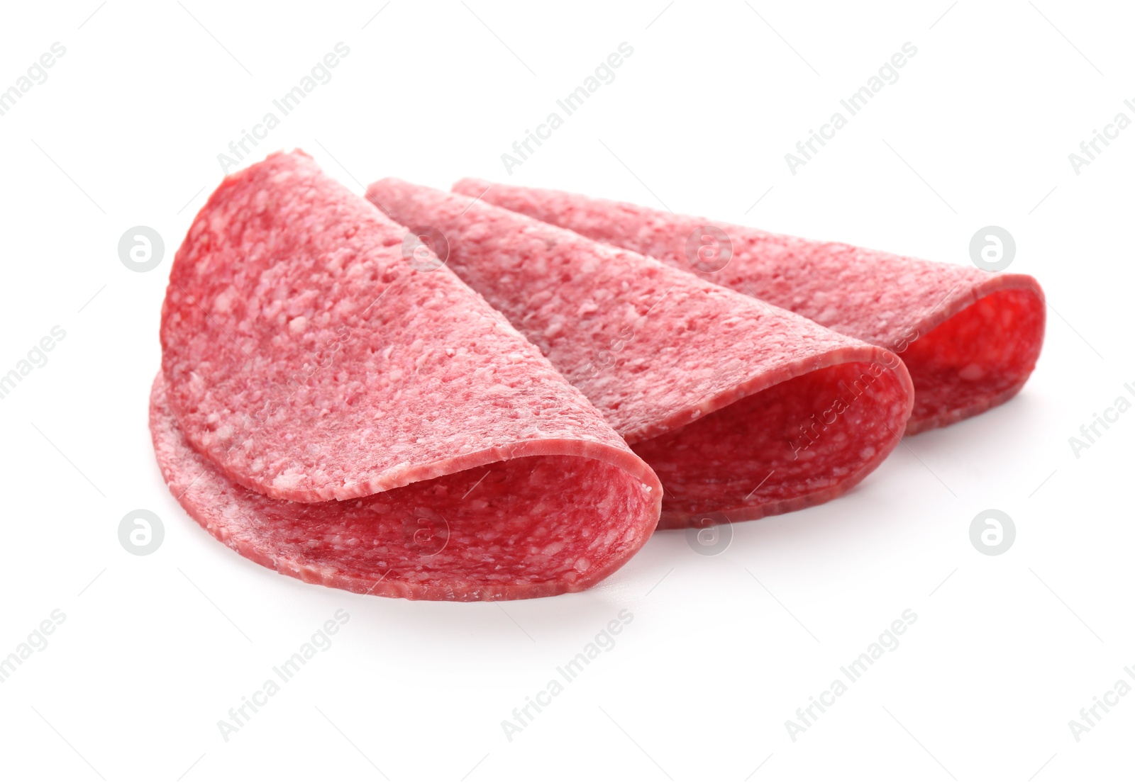 Slices of tasty smoked sausage isolated on white Photo of Slices of tasty smoked sausage isolated on white