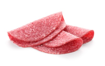 Photo of Slices of tasty smoked sausage isolated on white