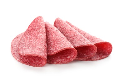 Photo of Slices of tasty smoked sausage isolated on white