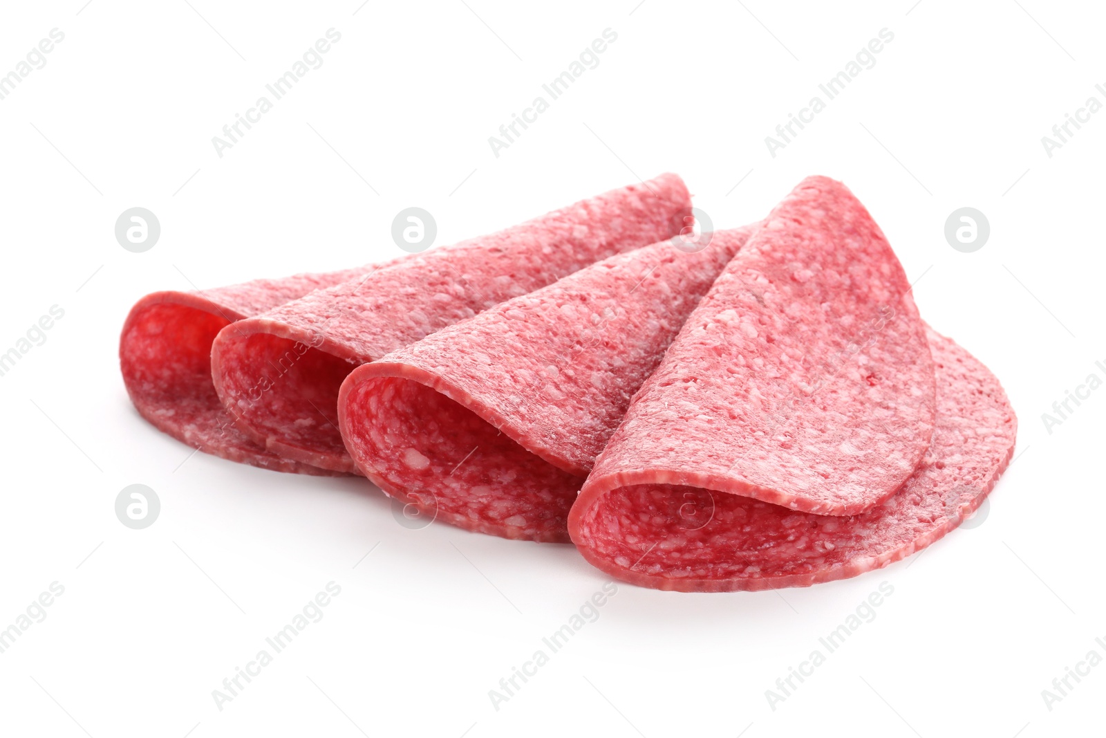 Slices of tasty smoked sausage isolated on white Photo of Slices of tasty smoked sausage isolated on white