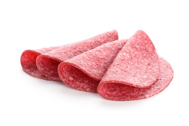 Photo of Slices of tasty smoked sausage isolated on white