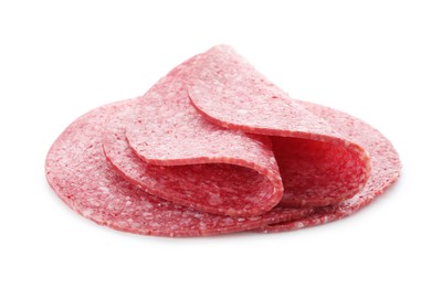 Photo of Slices of tasty smoked sausage isolated on white