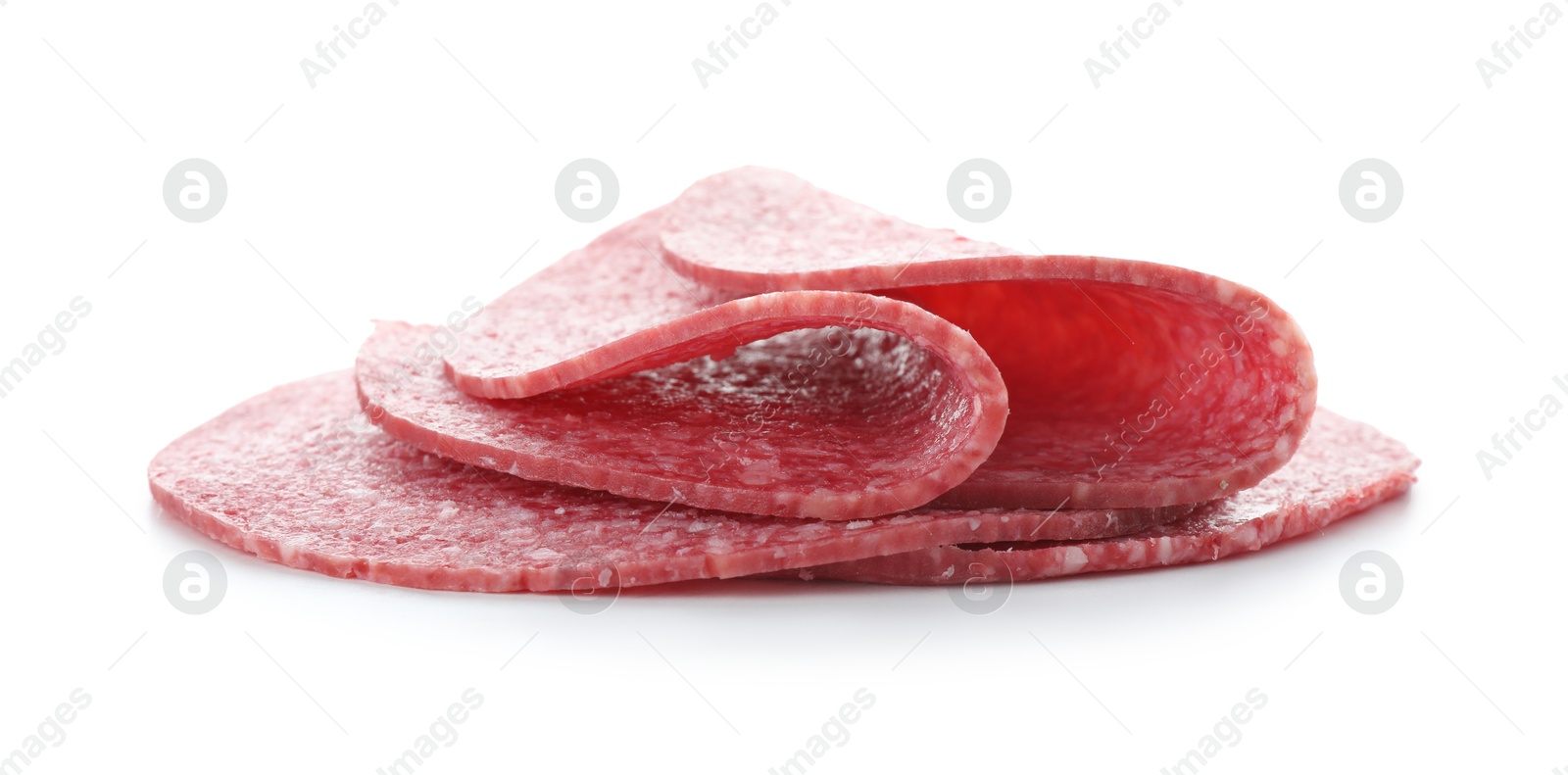 Photo of Slices of tasty smoked sausage isolated on white