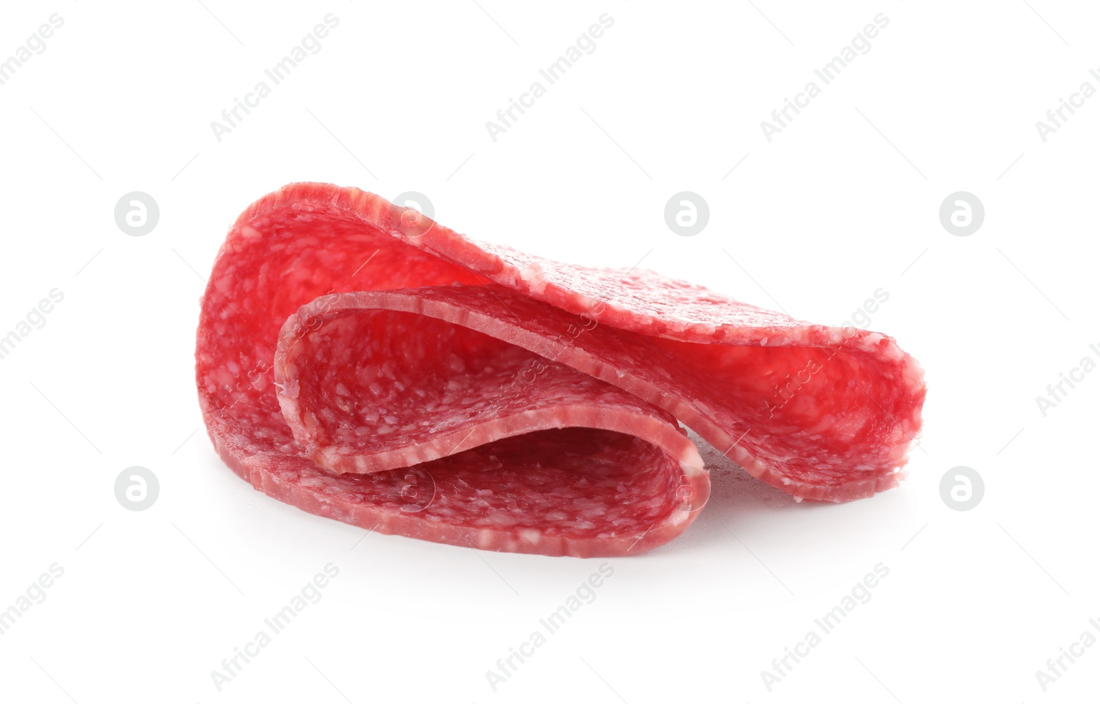Slice of tasty smoked sausage isolated on white Photo of Slice of tasty smoked sausage isolated on white