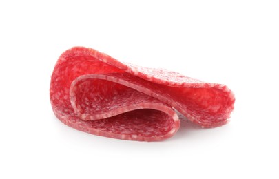 Photo of Slice of tasty smoked sausage isolated on white