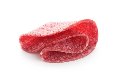 Photo of Slice of tasty smoked sausage isolated on white