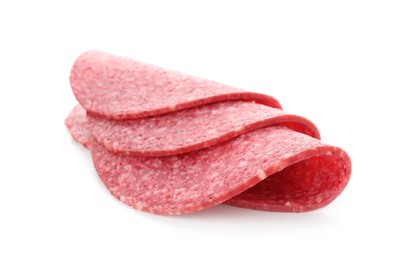 Photo of Slices of tasty smoked sausage isolated on white