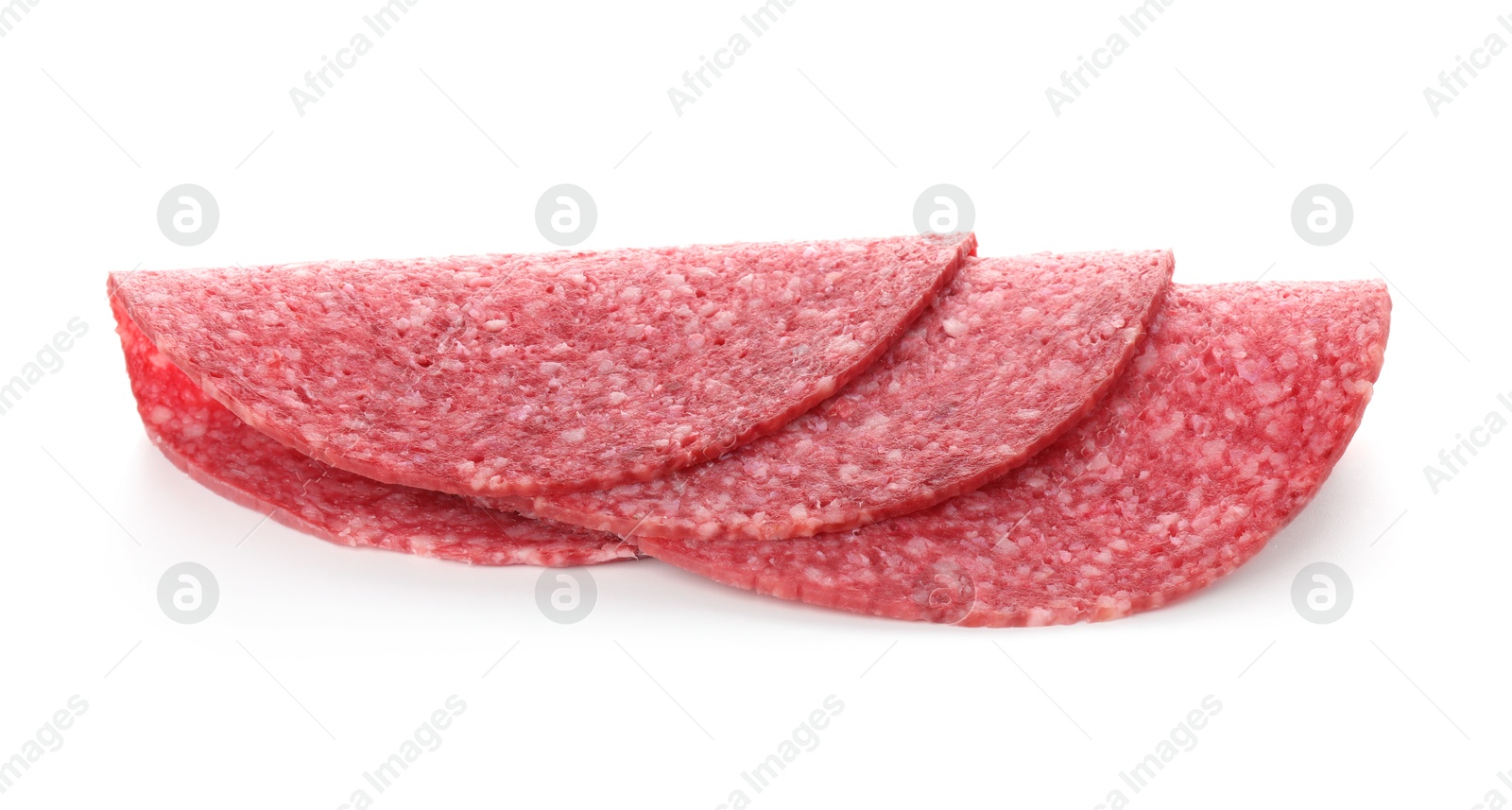 Photo of Slices of tasty smoked sausage isolated on white
