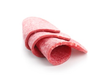 Photo of Slices of tasty smoked sausage isolated on white