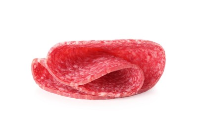 Photo of Slice of tasty smoked sausage isolated on white