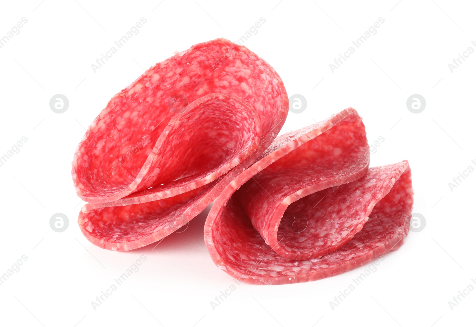 Photo of Slices of tasty smoked sausage isolated on white
