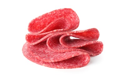 Photo of Slices of tasty smoked sausage isolated on white