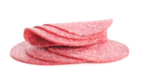 Photo of Slices of tasty smoked sausage isolated on white
