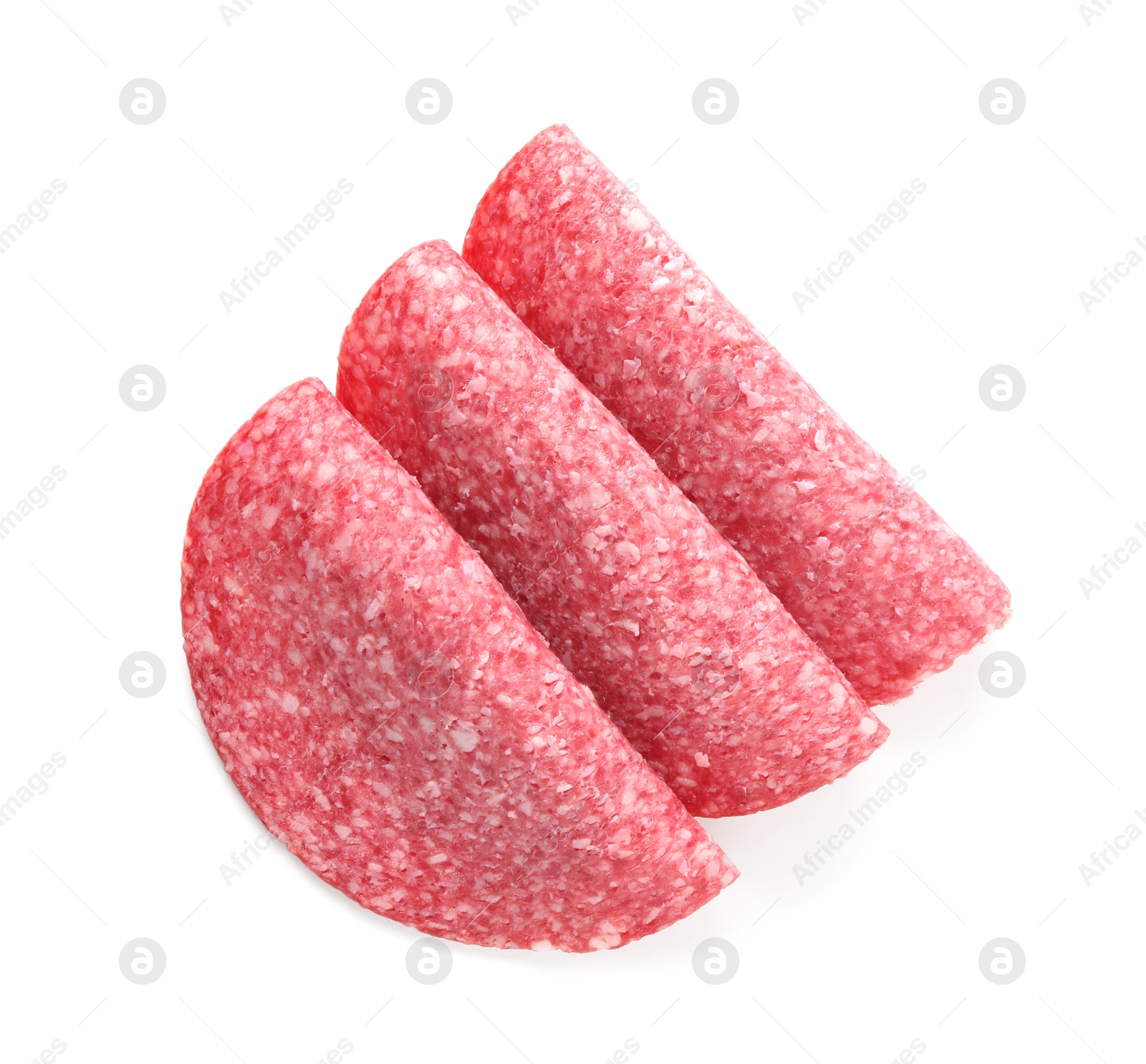 Slices of tasty smoked sausage isolated on white, top view Photo of Slices of tasty smoked sausage isolated on white, top view