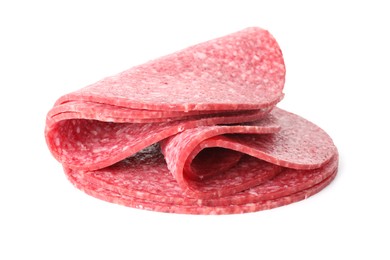 Photo of Slices of tasty smoked sausage isolated on white
