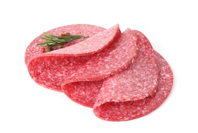 Photo of Slices of tasty smoked sausage with spices isolated on white