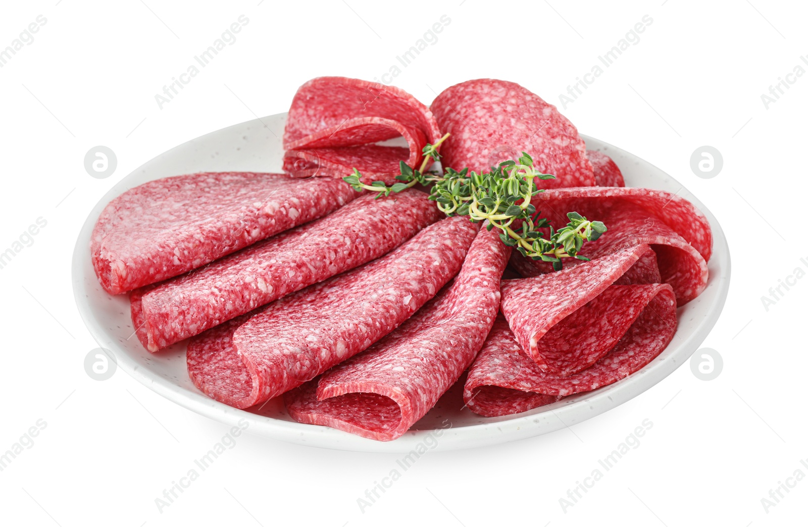 Slices of tasty smoked sausage with thyme isolated on white Photo of Slices of tasty smoked sausage with thyme isolated on white
