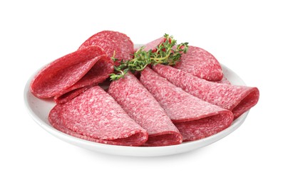 Photo of Slices of tasty smoked sausage with thyme isolated on white