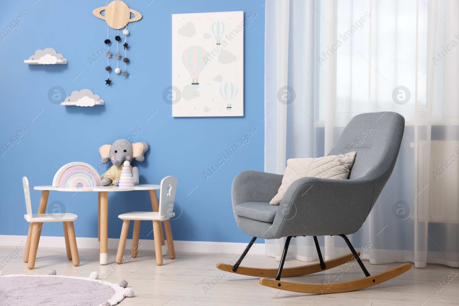 Child's room with stylish furniture and toys. Interior design Photo of Child's room with stylish furniture and toys. Interior design