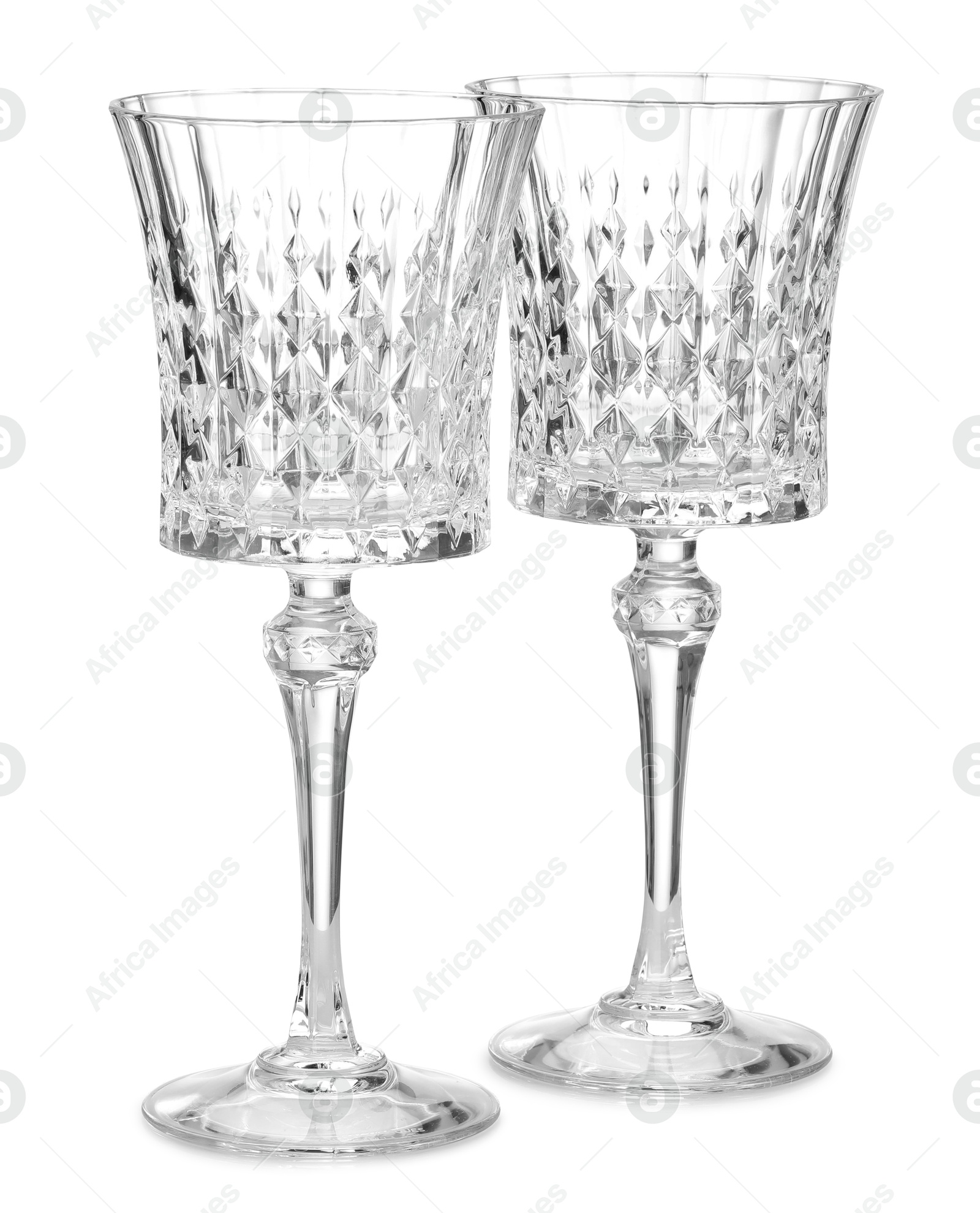 Two empty clean glasses isolated on white Photo of Two empty clean glasses isolated on white