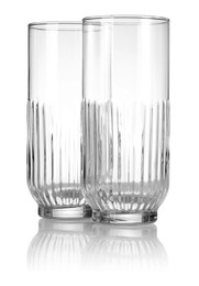 Photo of Two empty clean glasses isolated on white