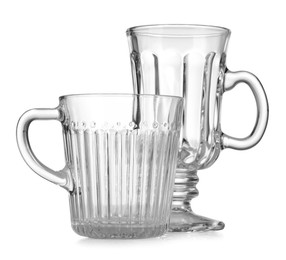 Photo of Different empty clean glasses isolated on white