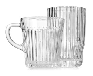 Photo of Different empty clean glasses isolated on white