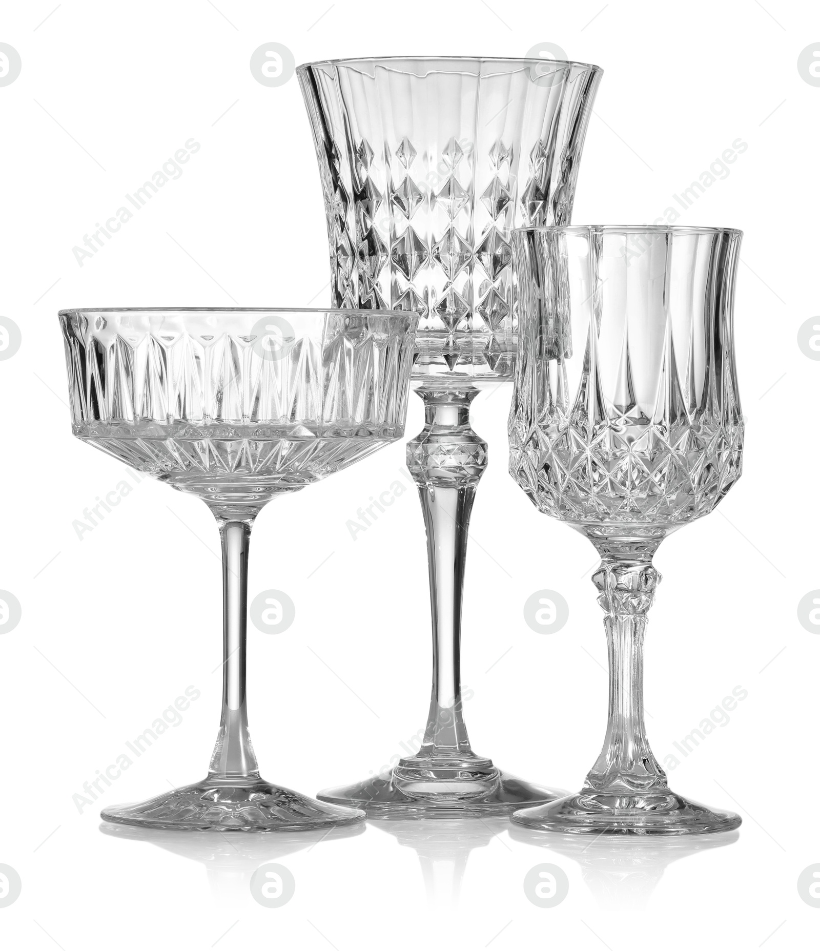 Different empty clean glasses isolated on white Photo of Different empty clean glasses isolated on white