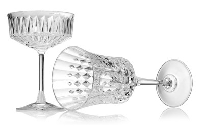 Photo of Different empty clean glasses isolated on white