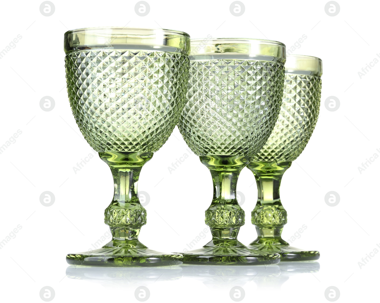 Three empty clean glasses isolated on white Photo of Three empty clean glasses isolated on white
