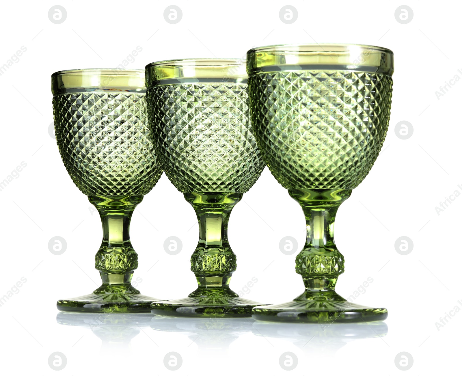 Three empty clean glasses isolated on white Photo of Three empty clean glasses isolated on white