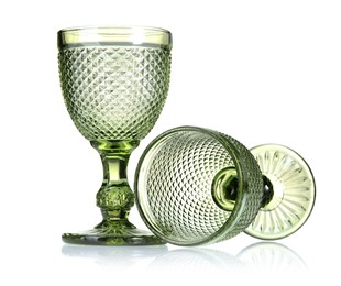 Photo of Two empty clean glasses isolated on white