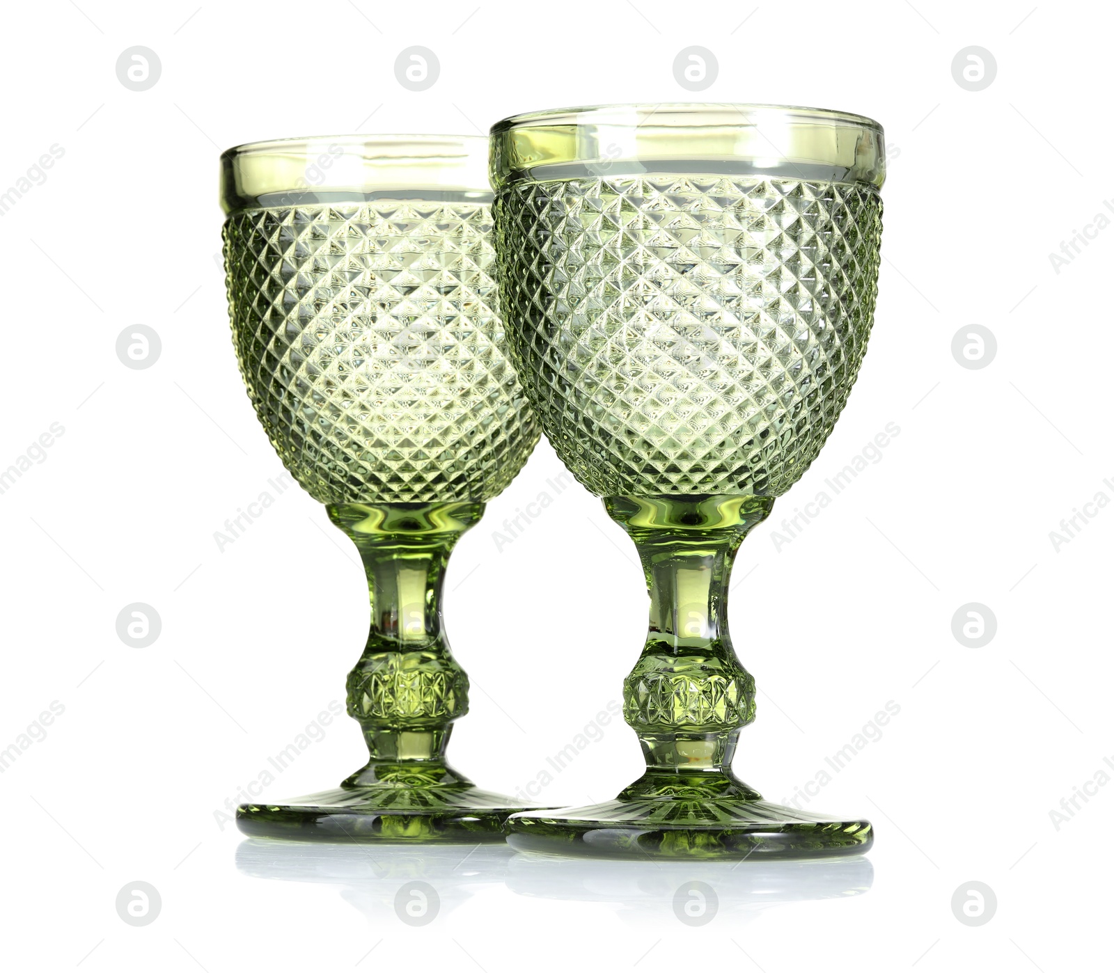 Two empty clean glasses isolated on white Photo of Two empty clean glasses isolated on white