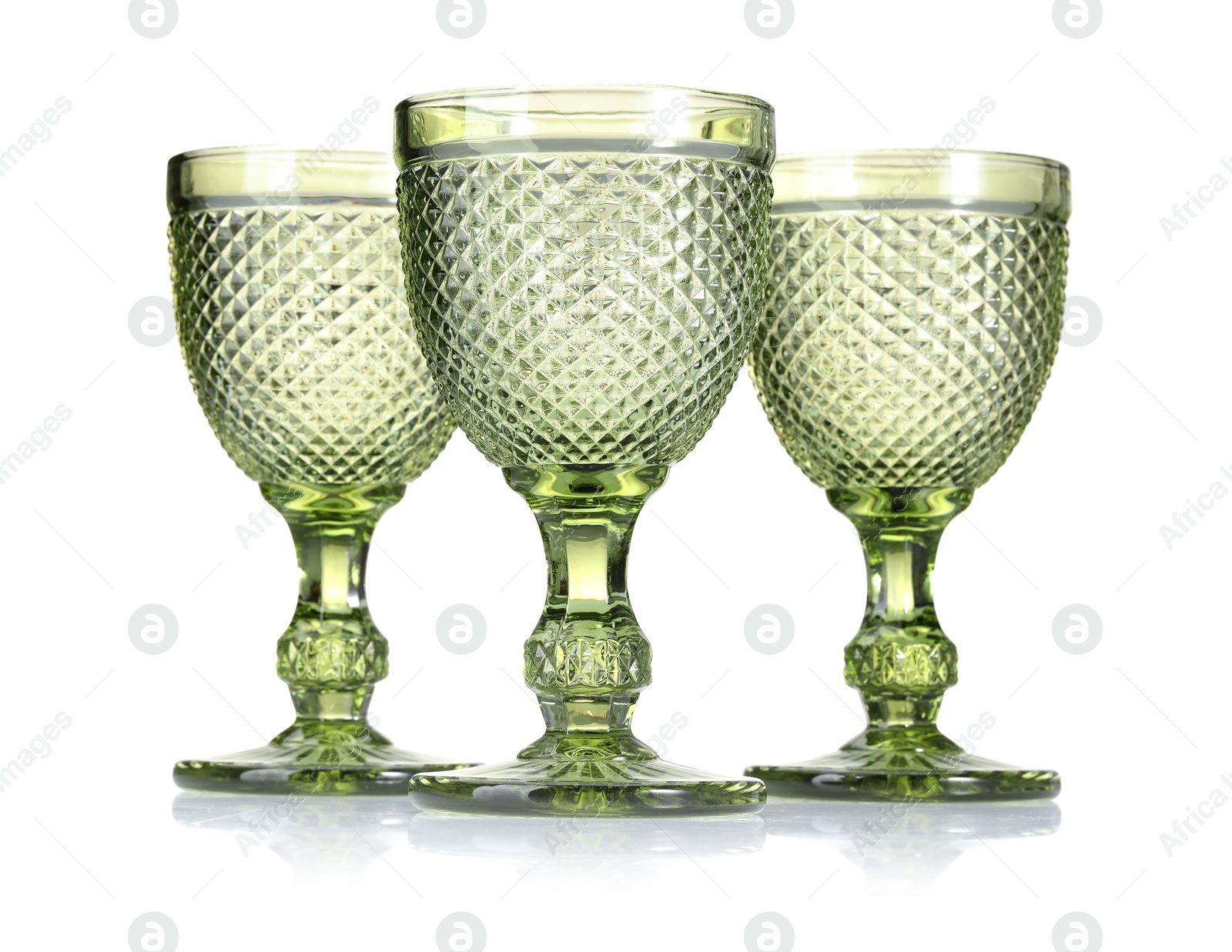 Three empty clean glasses isolated on white Photo of Three empty clean glasses isolated on white