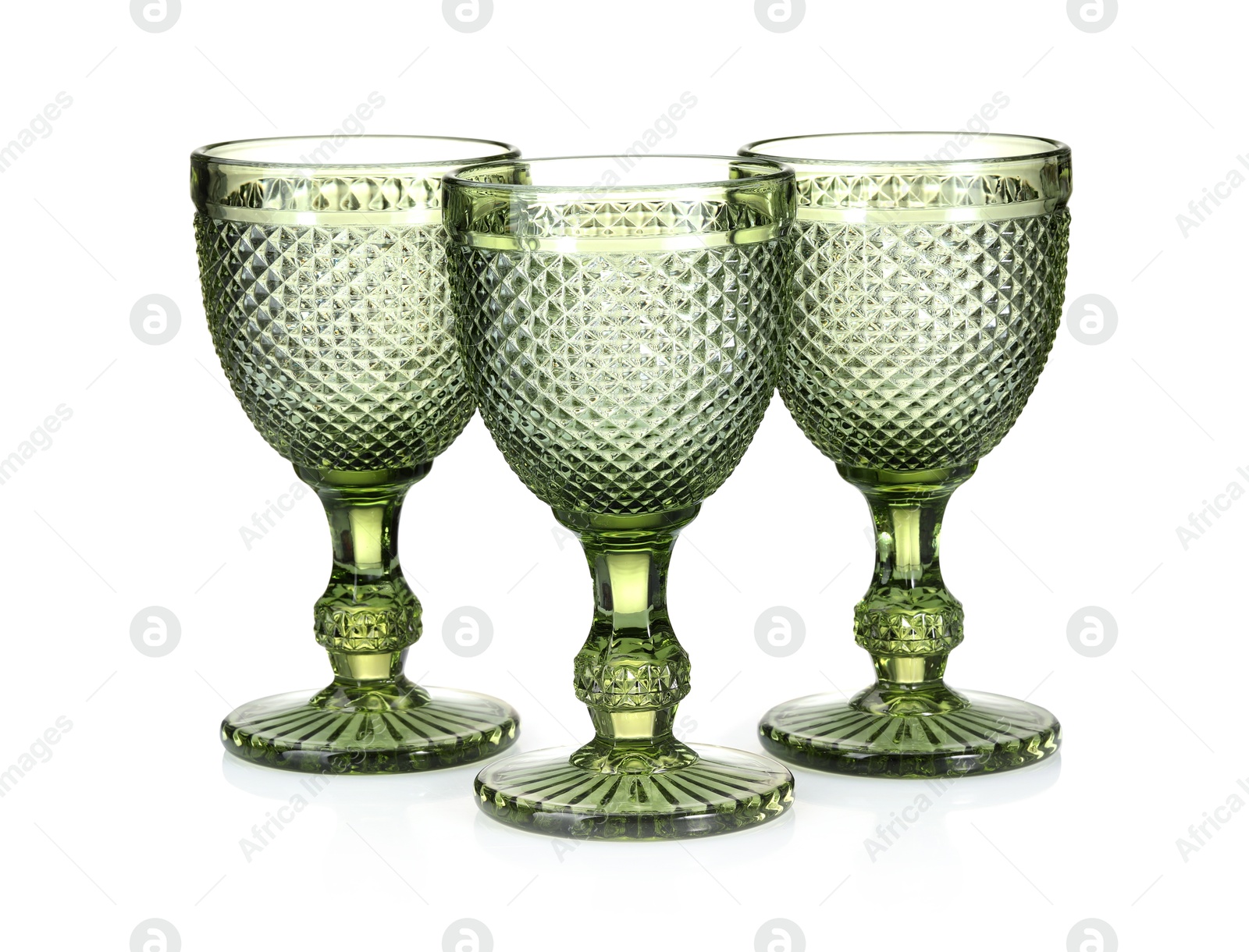 Three empty clean glasses isolated on white Photo of Three empty clean glasses isolated on white
