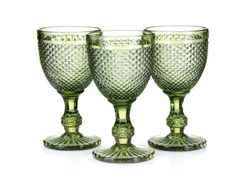 Photo of Three empty clean glasses isolated on white
