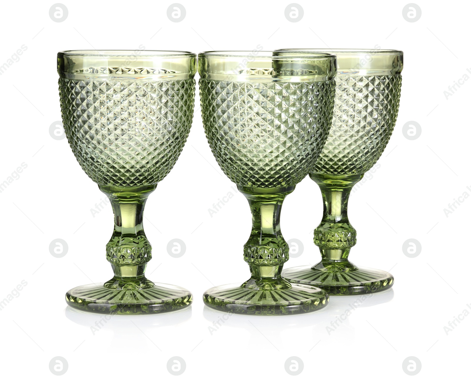 Three empty clean glasses isolated on white Photo of Three empty clean glasses isolated on white