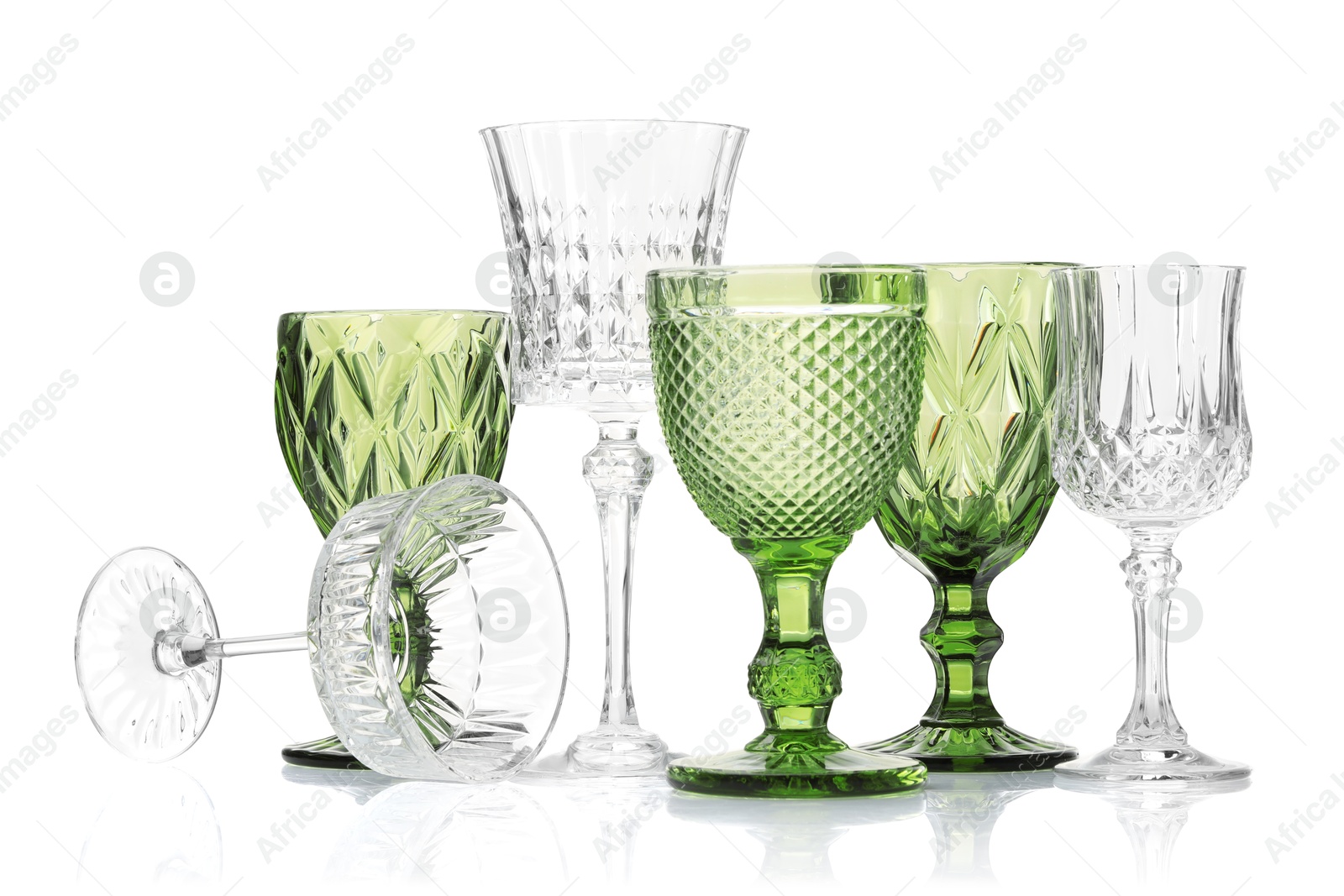 Different empty clean glasses isolated on white Photo of Different empty clean glasses isolated on white