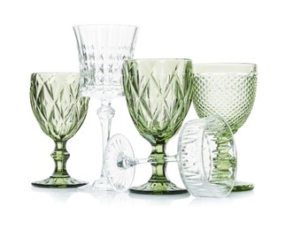 Photo of Different empty clean glasses isolated on white