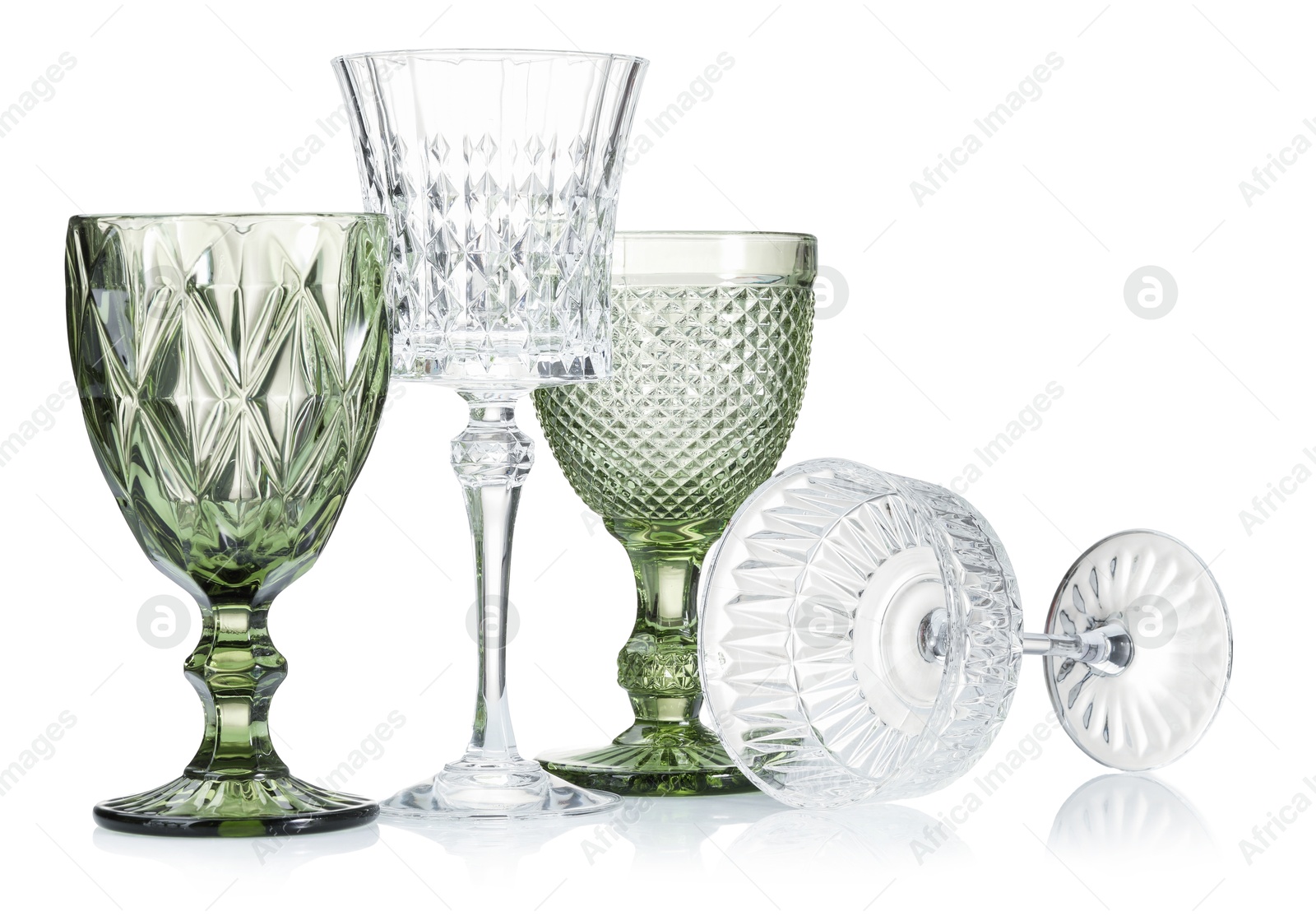 Different empty clean glasses isolated on white Photo of Different empty clean glasses isolated on white