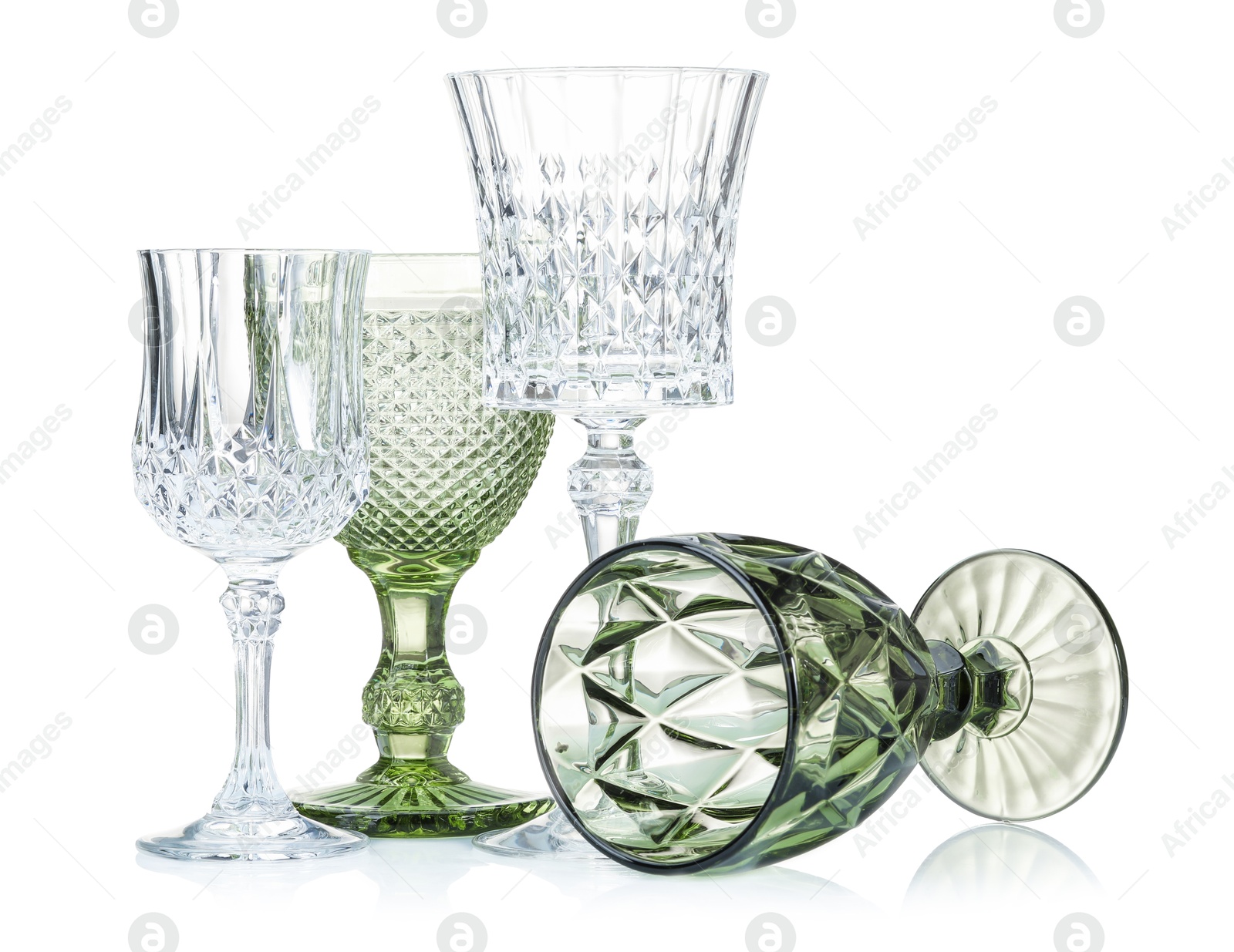 Different empty clean glasses isolated on white Photo of Different empty clean glasses isolated on white