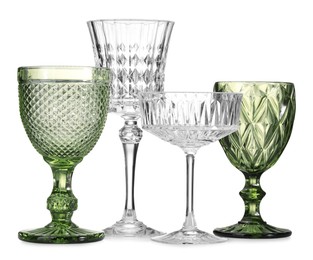 Photo of Different empty clean glasses isolated on white